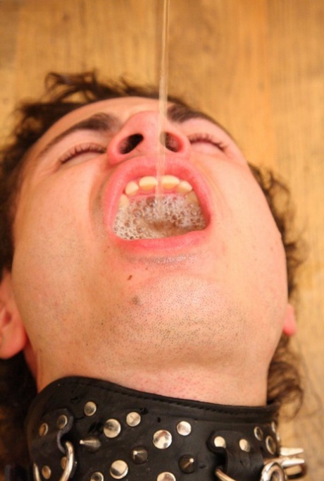 Dark haired chick Sasha Rose pisses into a submissive boy