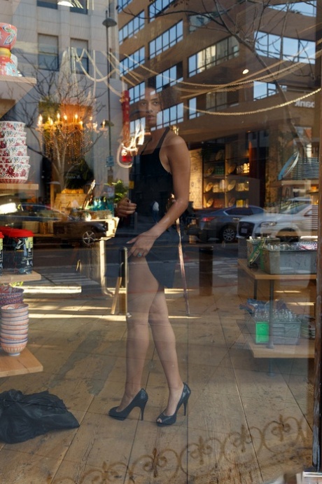 Petite ebony Desiree Jacobsen shows her tiny tits & bubble ass in a solo